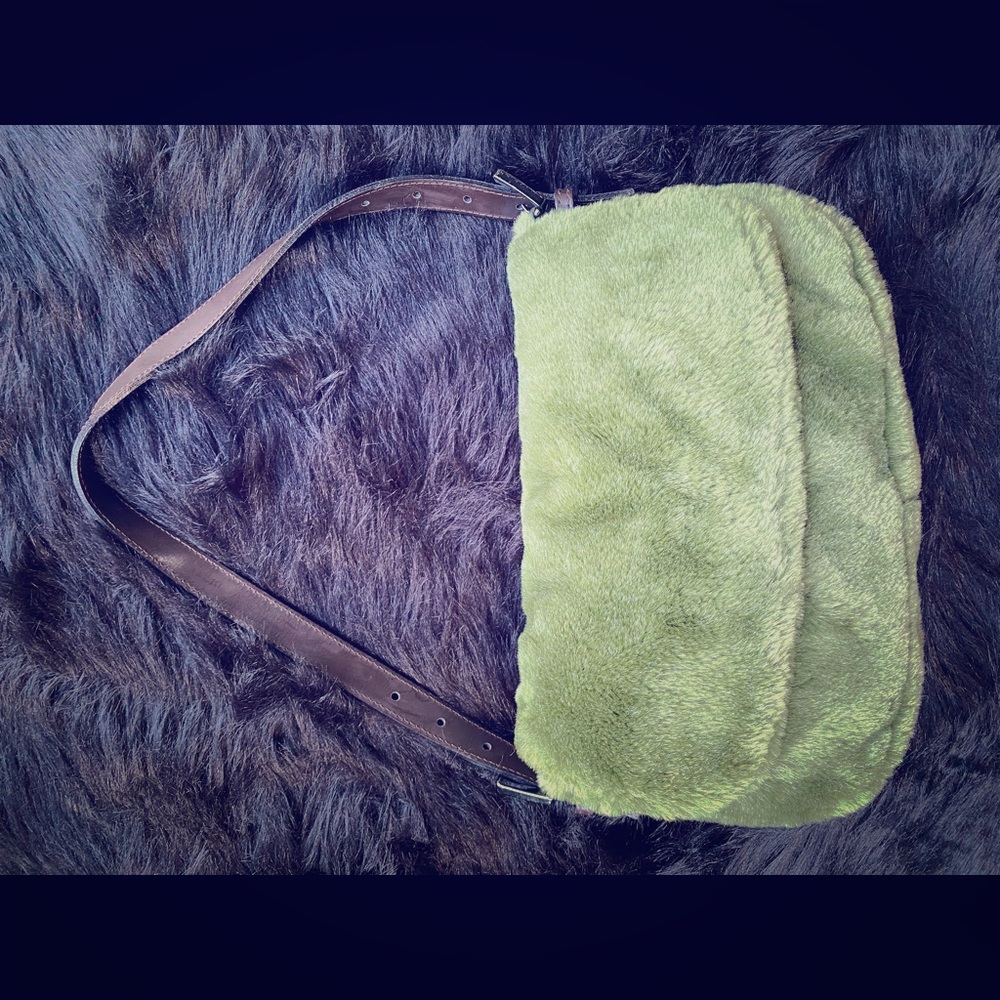 Fuzzy Furry green purse with brown handle.